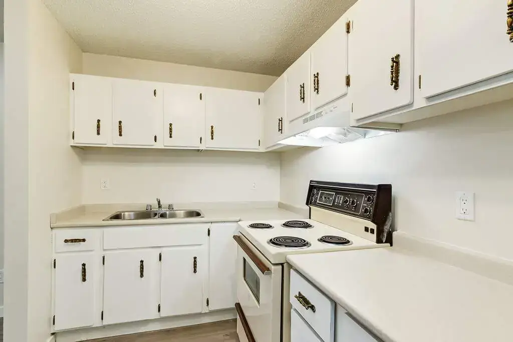 Open kitchen design connected to living space at King Art in Bonnyville.