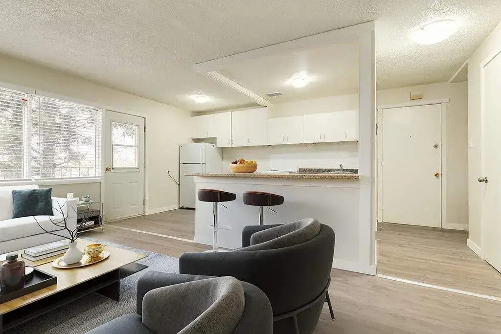 Open-layout kitchen and living room at Lakeview Apartments in Bonnyville.