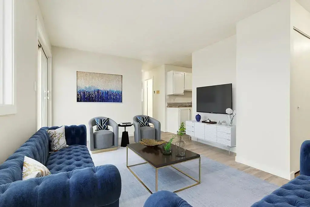 Living room with large windows and natural light at Matichuk in Bonnyville.