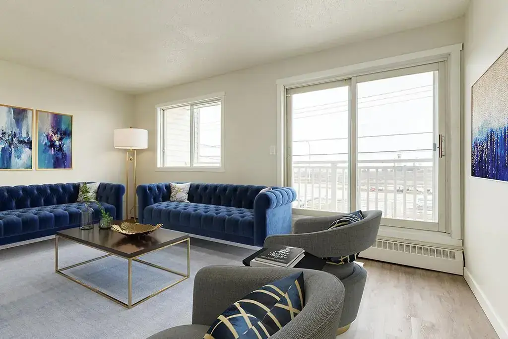 Bright living room with large windows at Matichuk in Bonnyville.