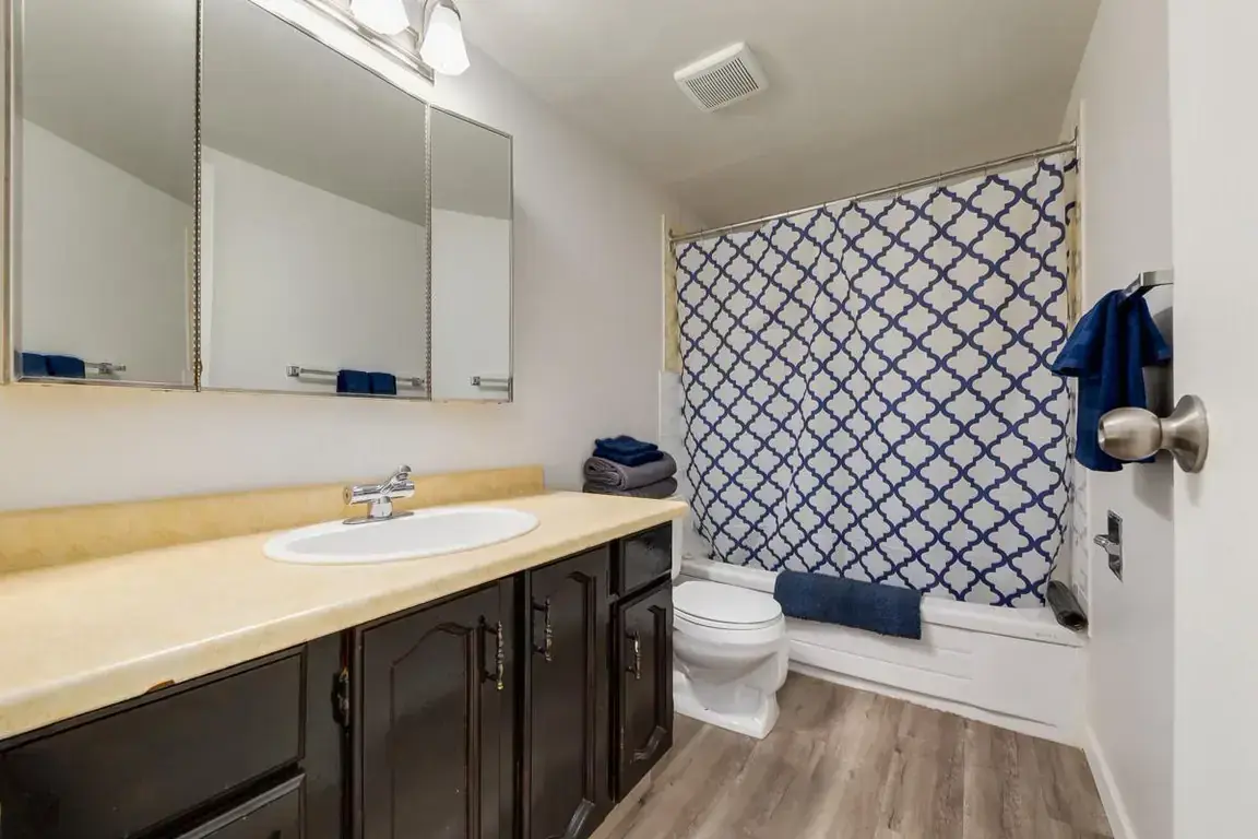 Comfortable full bathroom with tub and shower at Matichuk in Bonnyville.
