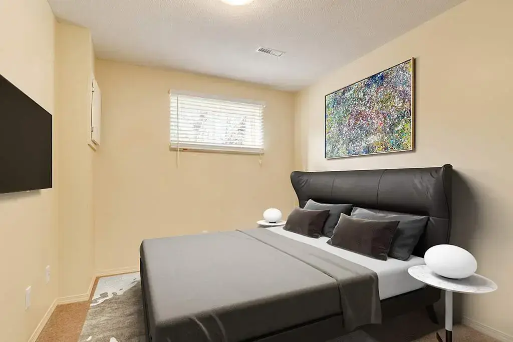 Open bedroom space with flexible layout at Spruce View Apartments in Camrose.