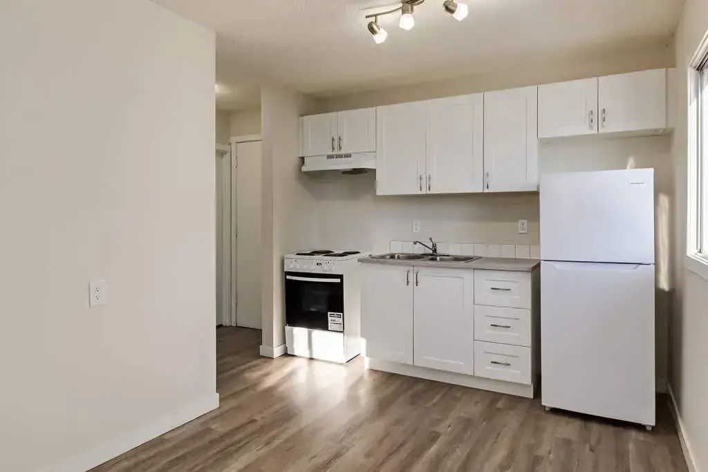 Open-concept kitchen at Aiva Manor in Edmonton