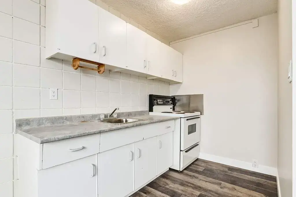 Functional kitchen at Cloverdale Apartments in Edmonton.