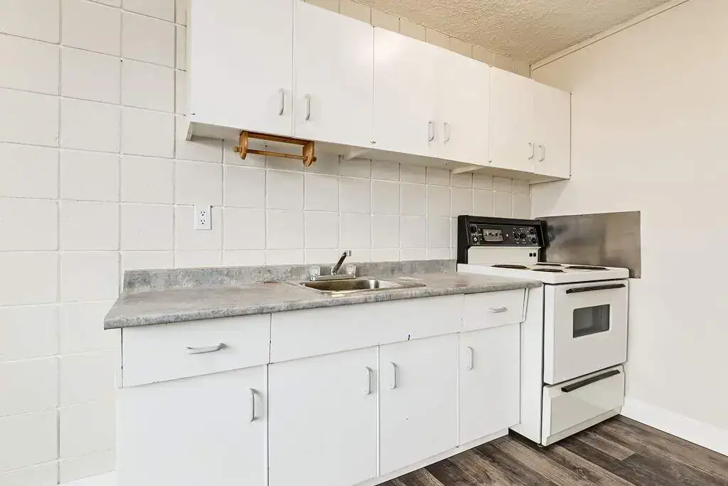 Functional kitchen at Cloverdale Apartments in Edmonton.