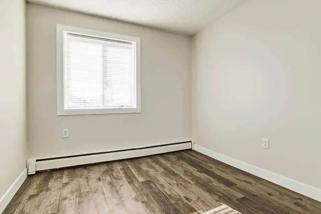Comfortable size bedrooms at Cloverdale Apartments in Edmonton.