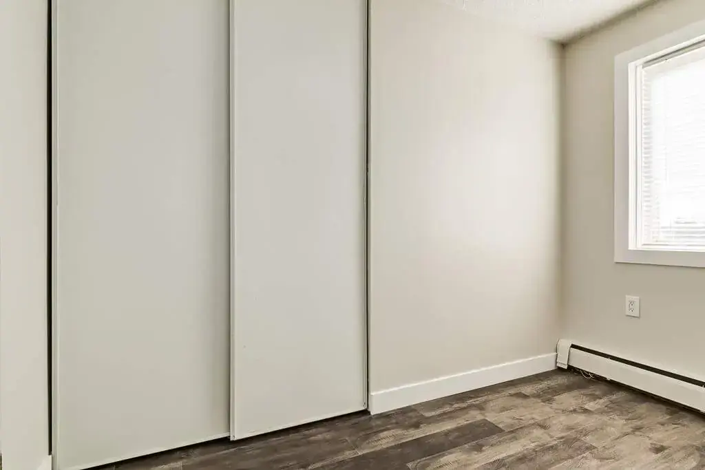 Comfortable size bedrooms at Cloverdale Apartments in Edmonton.