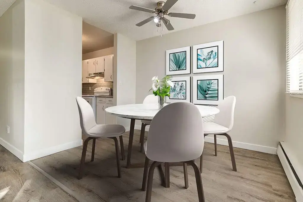 Dining area with natural light at Hudson Court in Edmonton.