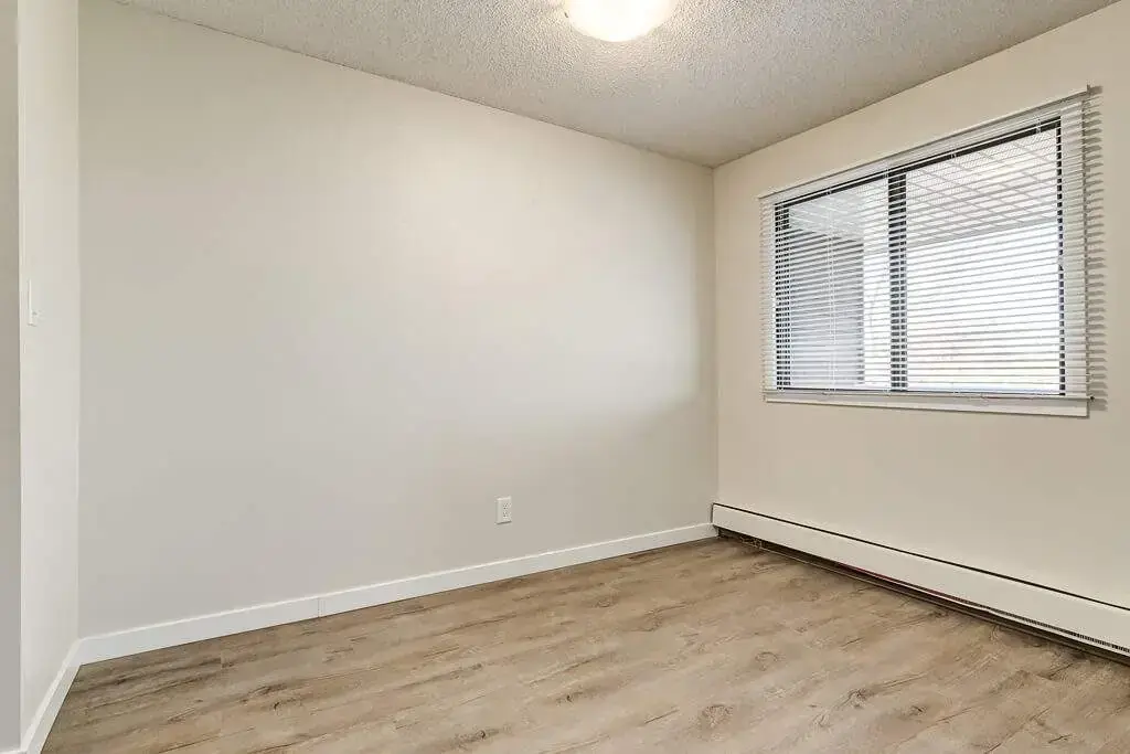 Good size dining corner with large window at Hudson Court in Edmonton.