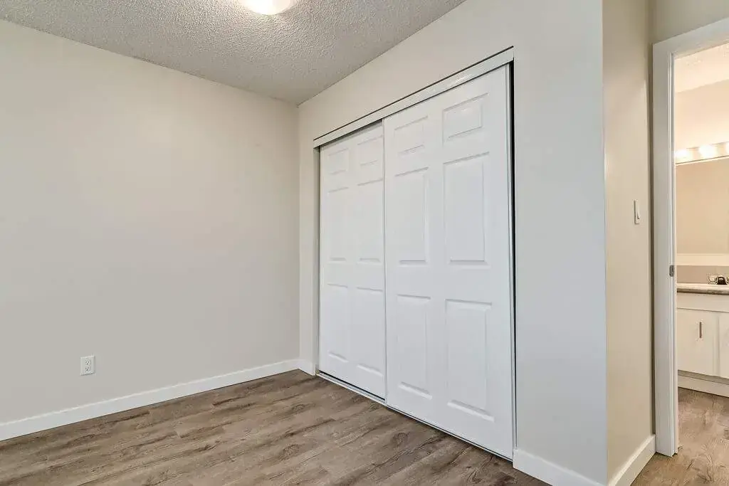 Comfortable size bedroom at Hudson Court in Edmonton.