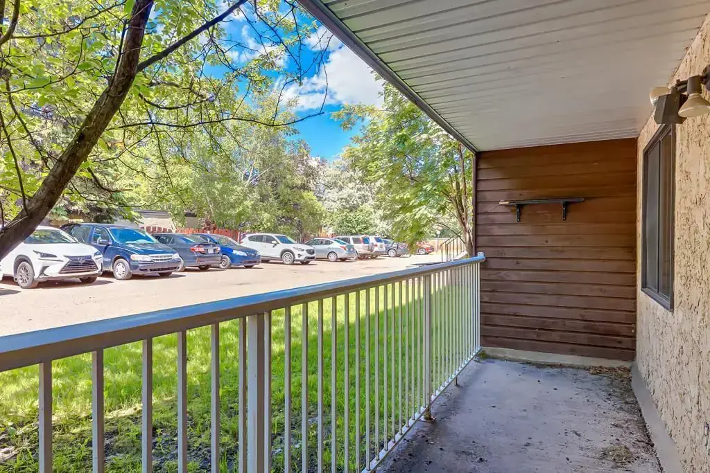Great size balcony overlooking parking at Hudson Court apartments in Edmonton.