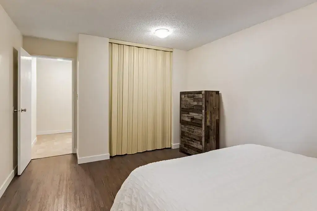 Comfortable size bedroom at Hudson Court in Edmonton.