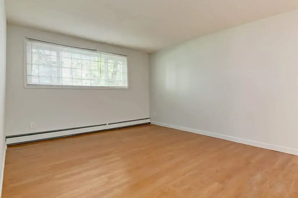 Comfortable size bedroom at Lenita Manor in Edmonton.