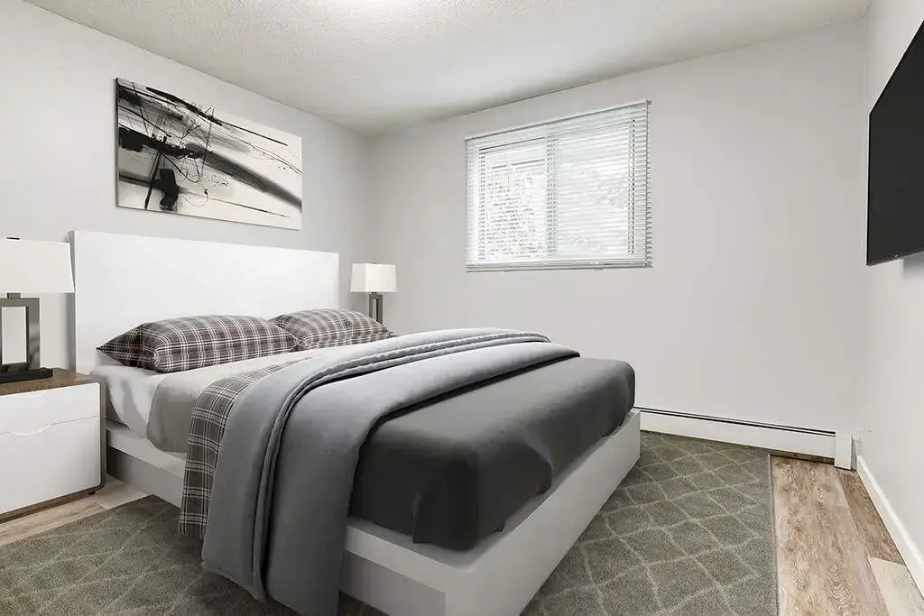 Comfortable size bedroom at Linda Manor in Edmonton.