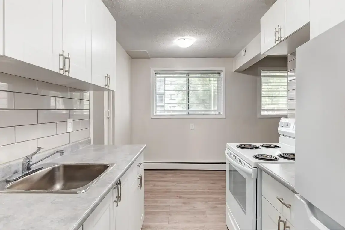 Galley style kitchen at Lockwood Apartments in Edmonton.