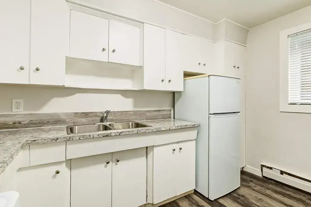 Kitchen with natural light at Phelips Apartments in Edmonton.