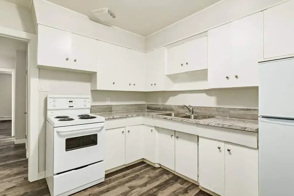 Kitchen with natural light at Phelips Apartments in Edmonton.