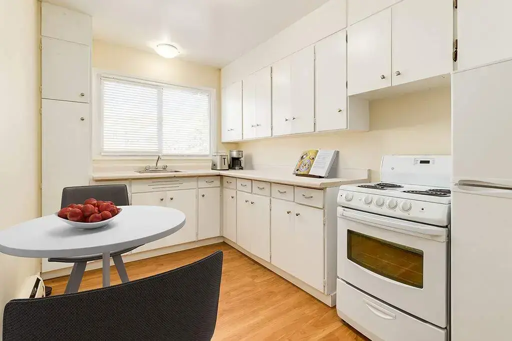 Bright open-concept kitchen area at Skyview Apartments in Edmonton.