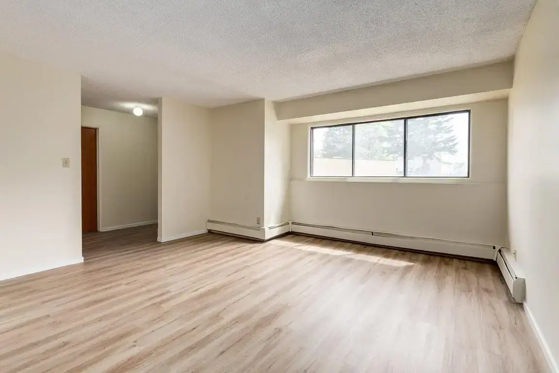Generous living room area at South Ridge Apartments in Edmonton.