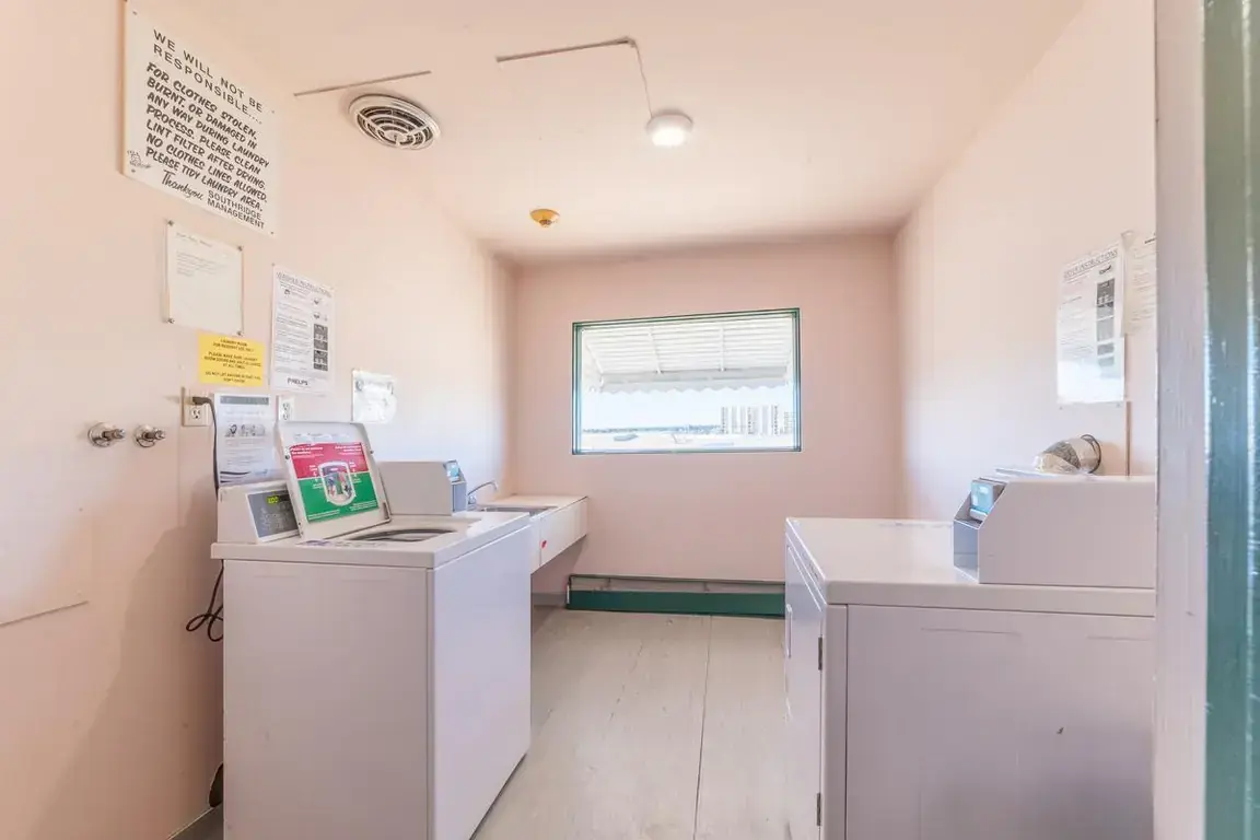 Coin-operated laundry at South Ridge Apartments in Edmonton.