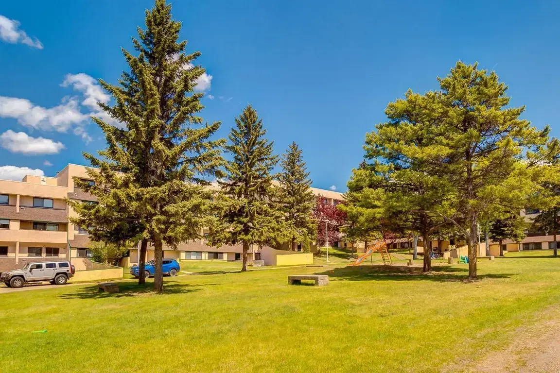 Well-maintained green area at South Ridge Apartments in Edmonton.