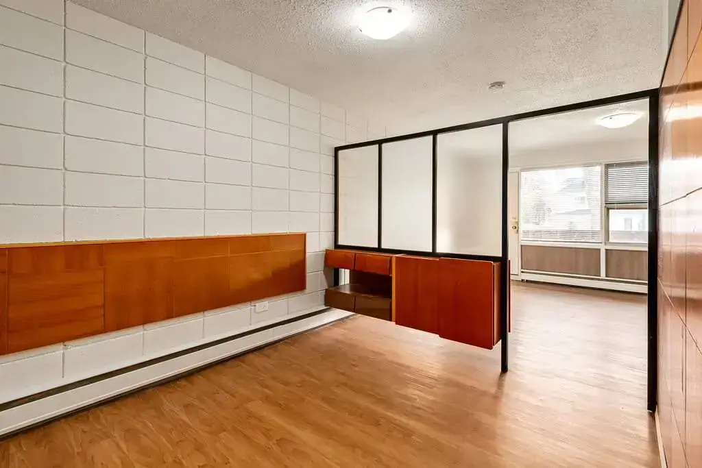 Living room and dining area at Bel-Aire Apartments in Lethbridge.