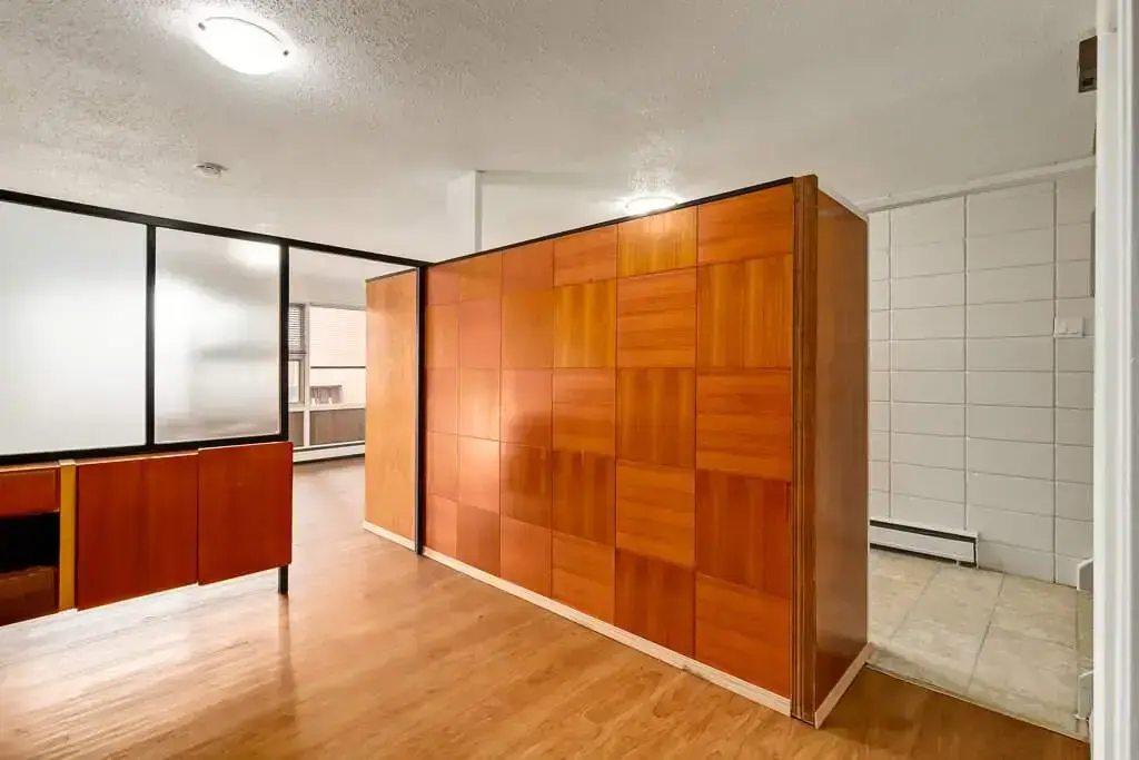 Living room and dining area at Bel-Aire Apartments in Lethbridge.