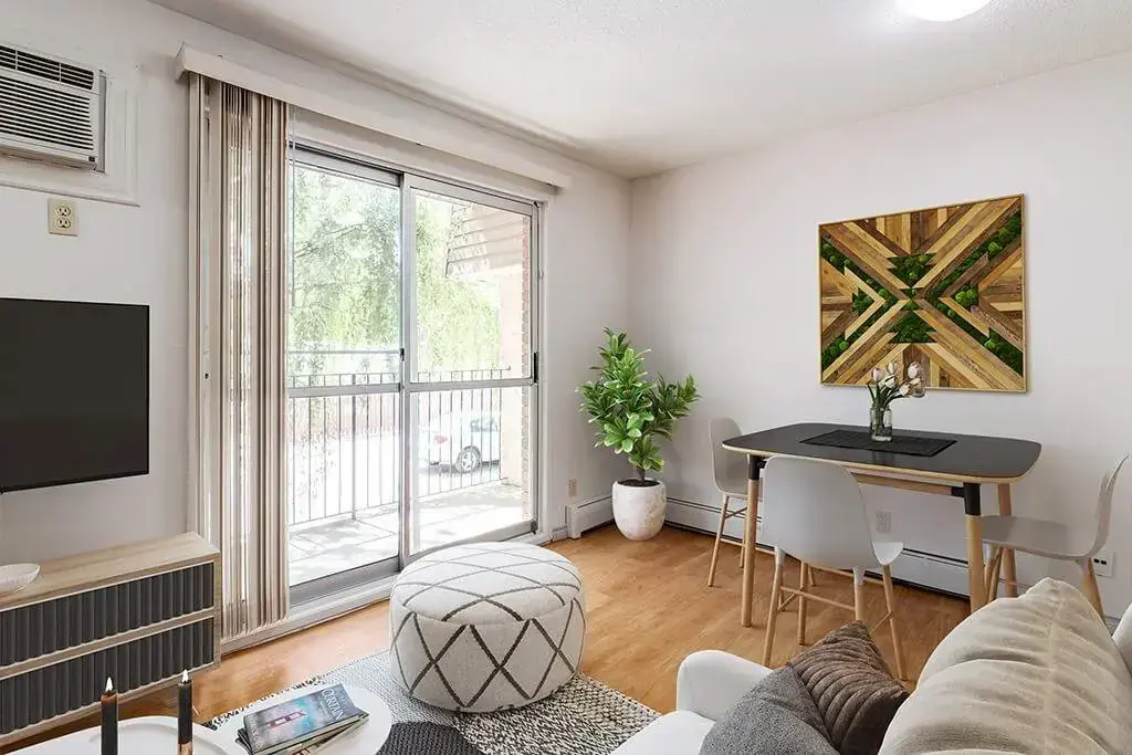 Living room filled with natural light at Kosmo Apartments in Lethbridge.