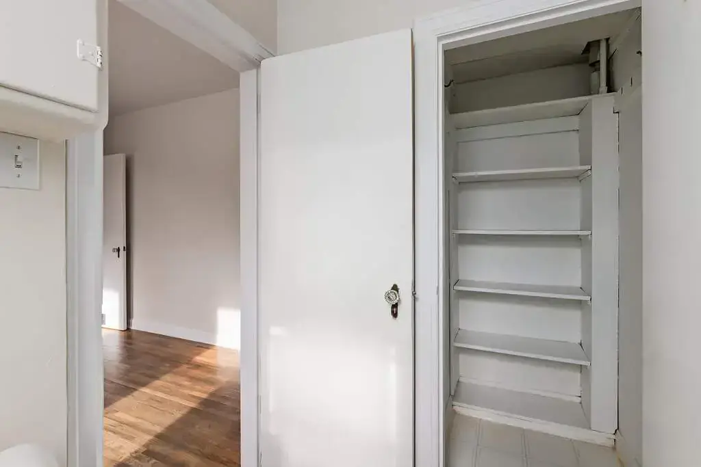 Walk-in closet at Tudor Manor in Lethbridge.