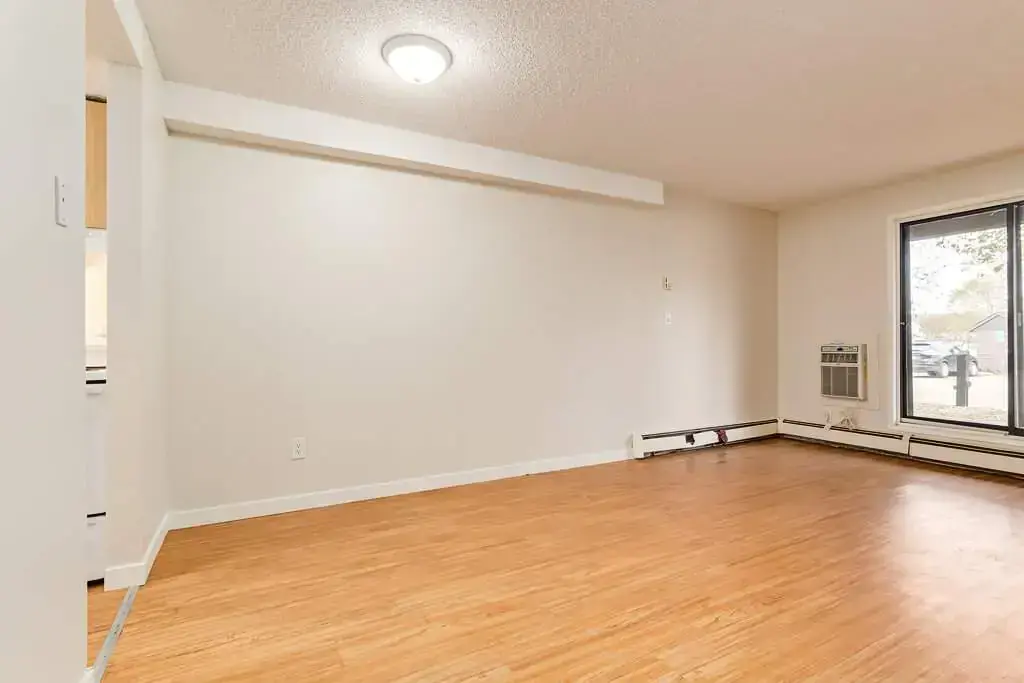 Bright living room with natural light at Cambridge Court in Lloydminster.