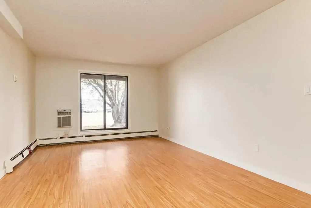 Bright living room with natural light at Cambridge Court in Lloydminster.
