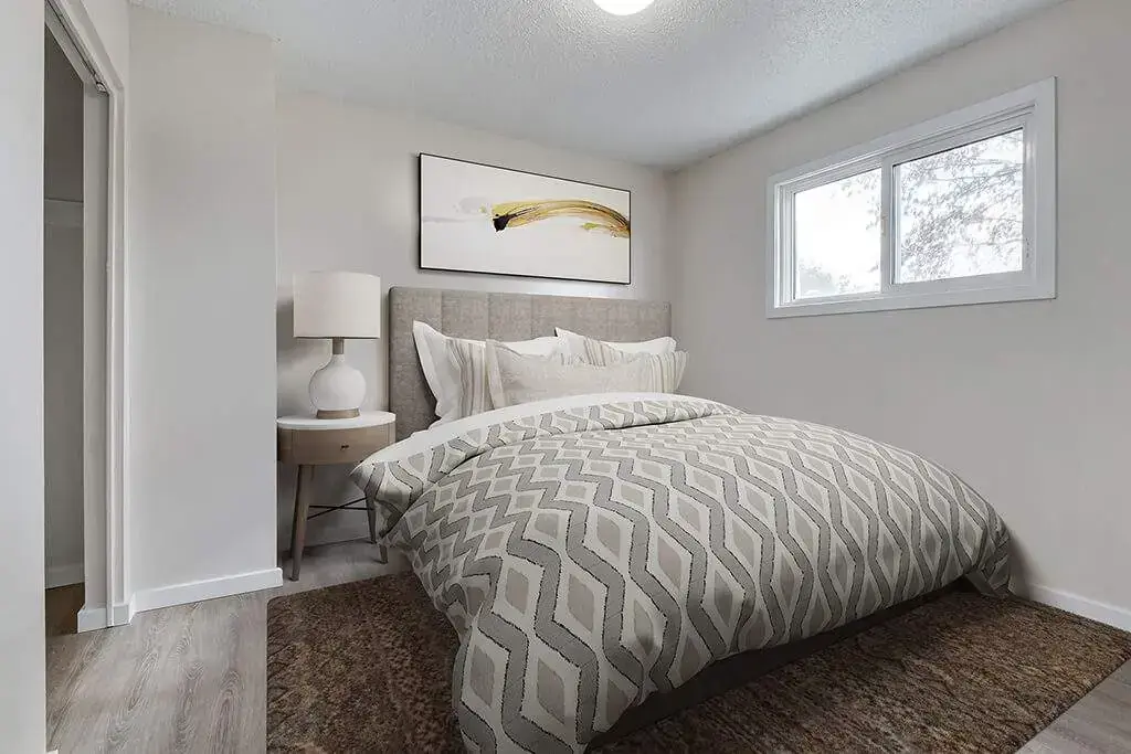 Comfortable and well-sized bedroom at Manville Bay in Prince Albert.