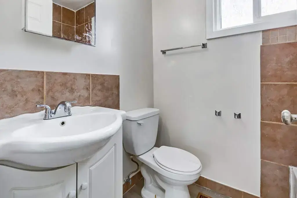 Full bathroom with bathtub and shower combination at Manville Bay in Prince Albert.