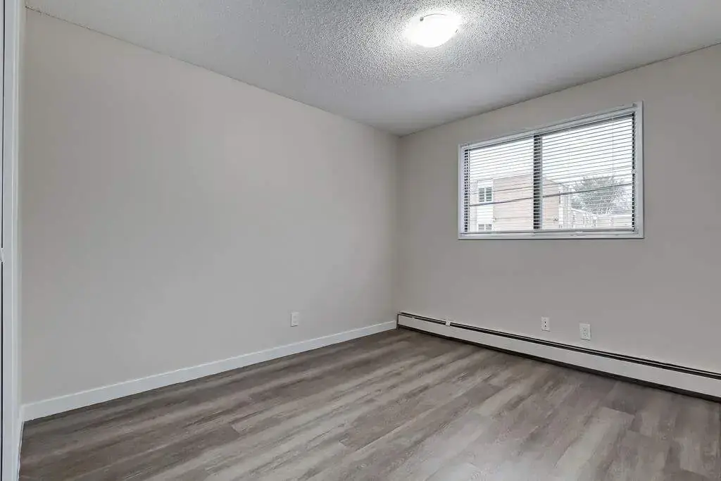 Good size bedroom at Caswell Manor in Saskatoon.