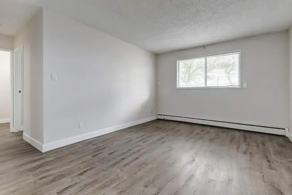 Comfortable living room at Erica Louise Manor in Saskatoon.