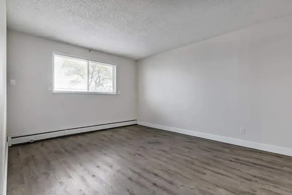 Comfortable living room at Erica Louise Manor in Saskatoon.