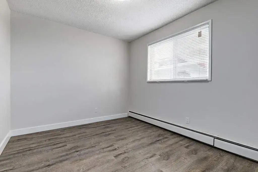 Good size bedroom at Erica Louise Manor in Saskatoon.