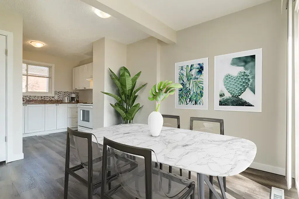 Open layout kitchen with dining area at Country View Estates in Wetaskiwin.