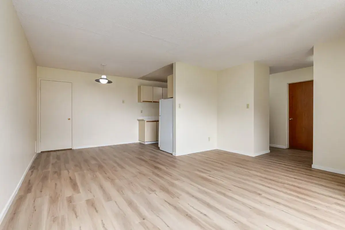 Open kitchen design connected to living space at South Ridge Apartments in Edmonton.