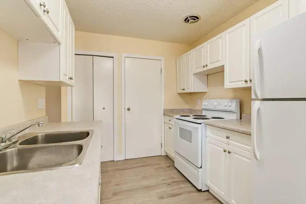 Bright galley style kitchen at Gerard Estates in Wetaskiwin.