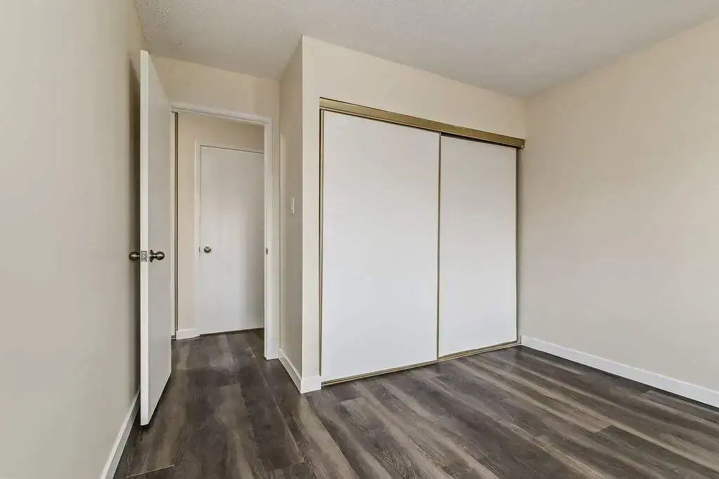 Comfortable and well-sized bedroom at Westwind Apartments in Wetaskiwin.