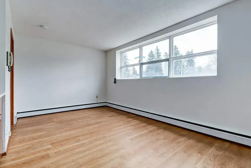 Living room filled with natural light at Crescent Court in Yorkton.
