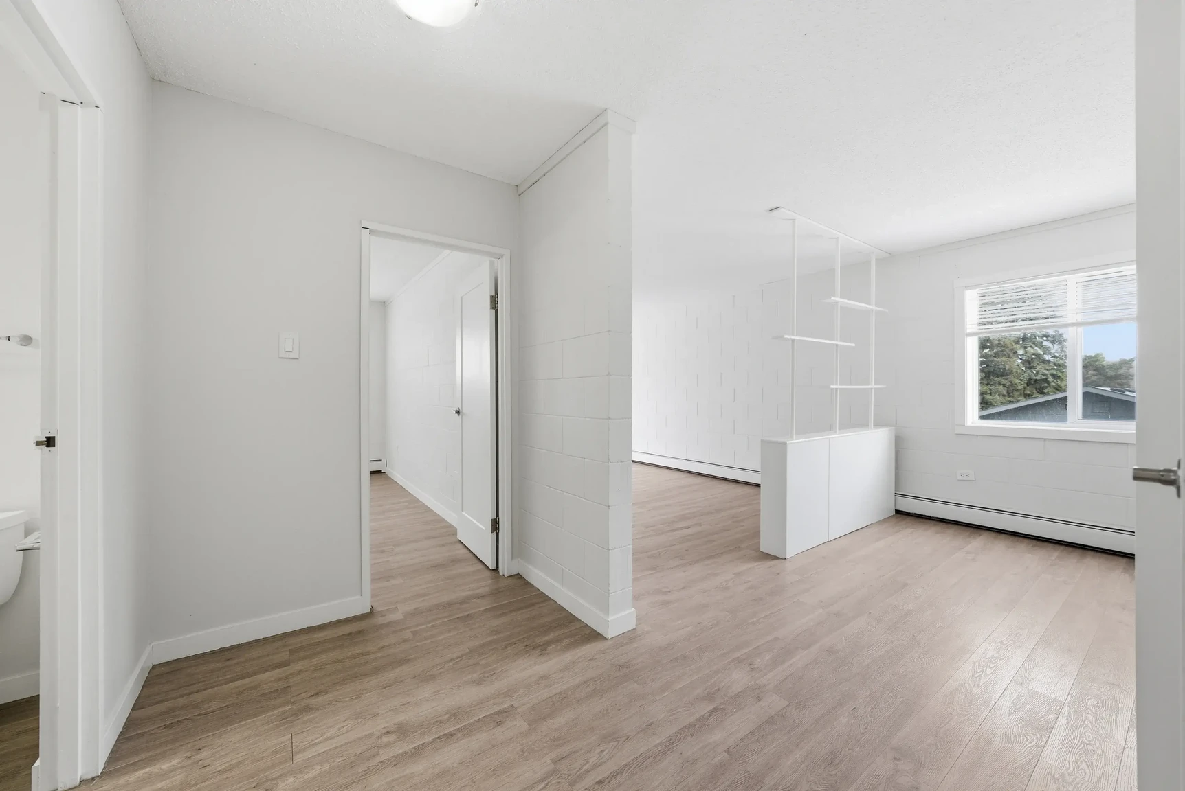 Open living room space at Miami Apartments in Saskatoon.