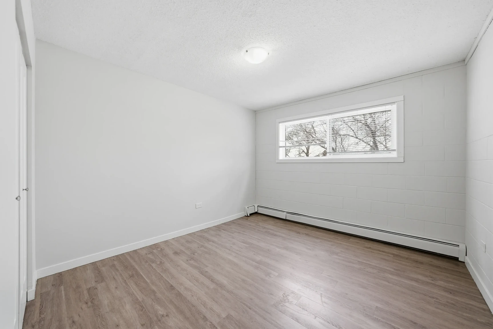 Good size bedroom at Miami Apartments in Saskatoon.