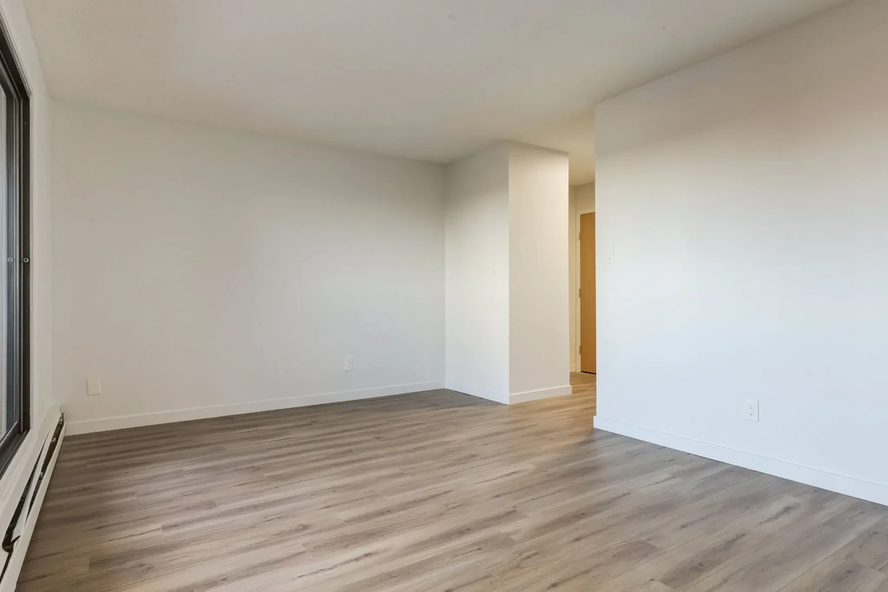 Inviting living room space at South Ridge Apartments in Edmonton.