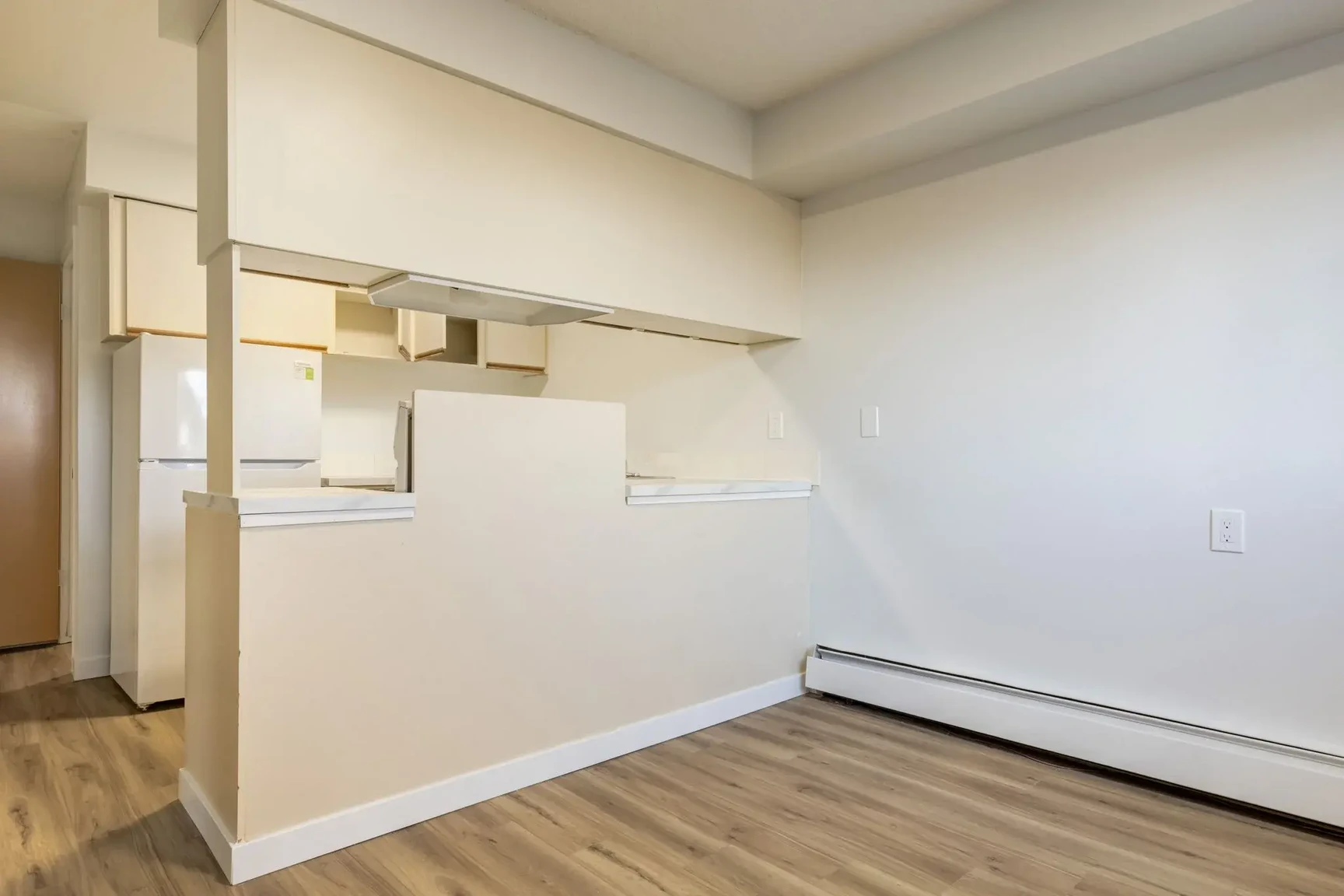 Dining area with natural light at South Ridge Apartments in Edmonton.