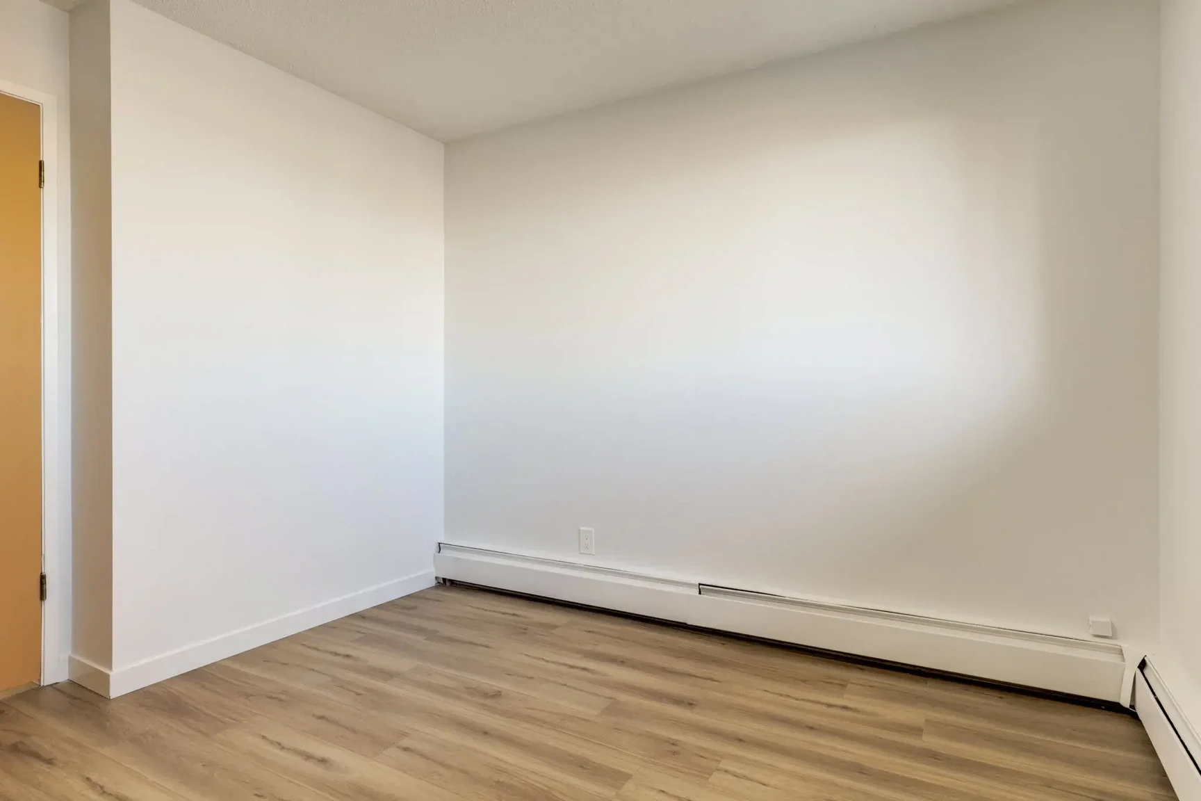 Comfortable size bedroom at South Ridge Apartments in Edmonton.