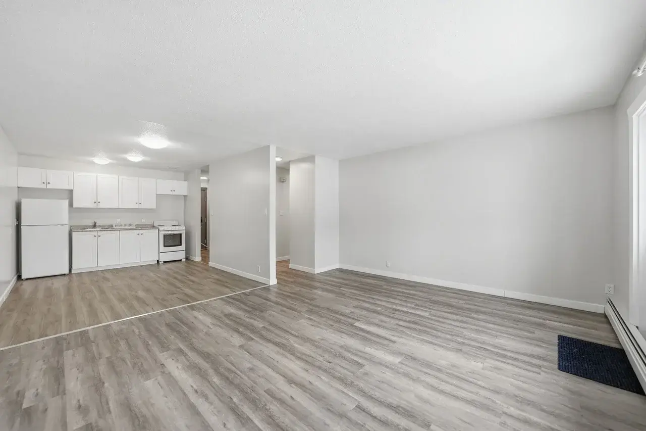 Open kitchen design connected to living space at Thomas Manor in Prince Albert.