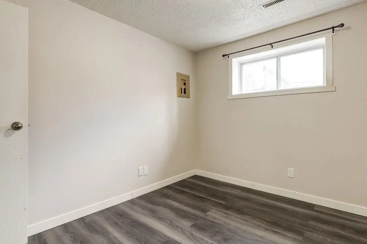 Comfortable and well-sized bedroom at Spruce View Apartments in Camrose.