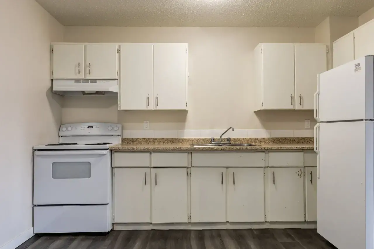 Open kitchen design connected to living space at Spruce View Apartments in Camrose.